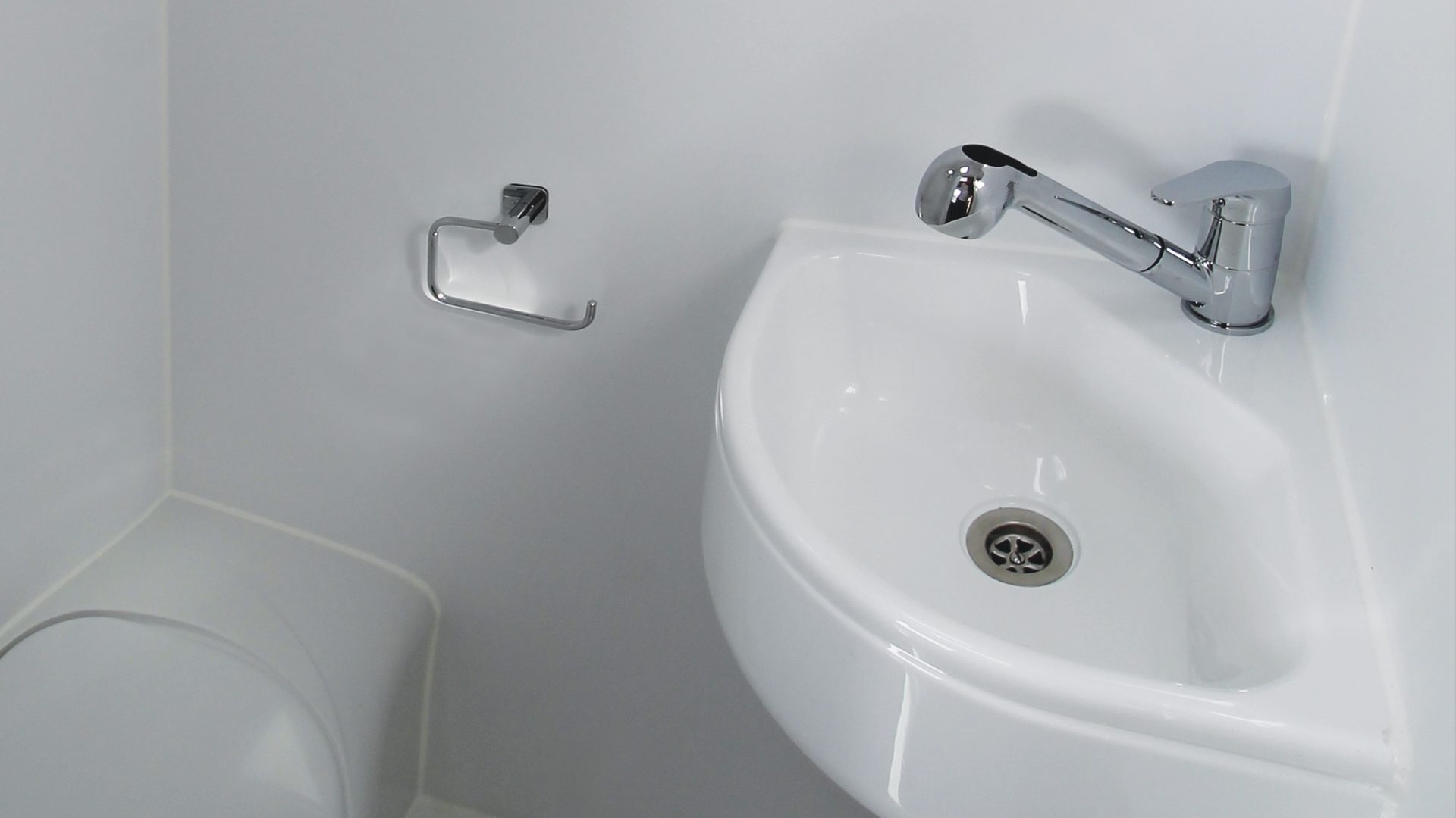 The corner basin on the COVE van conversion motorhome.
