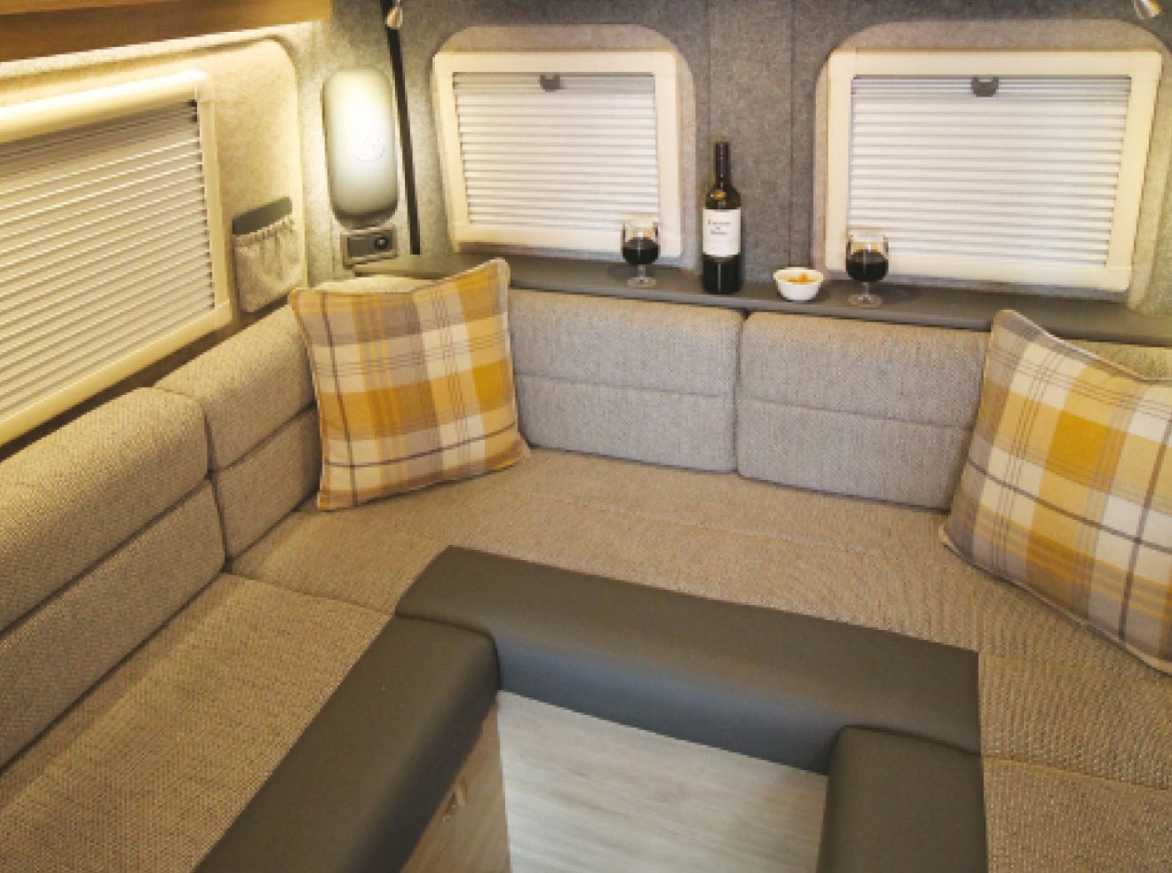 The U-Shaped lounge on the COVE van conversion motorhome.