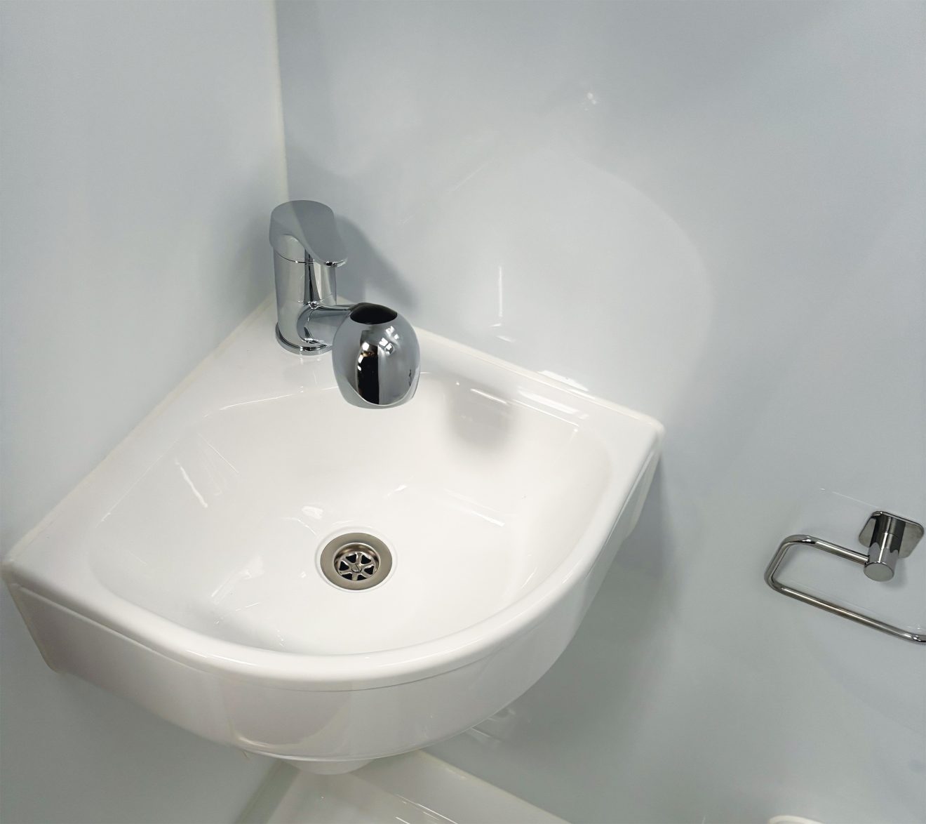 The corner basin on the DUET van conversion motorhome.