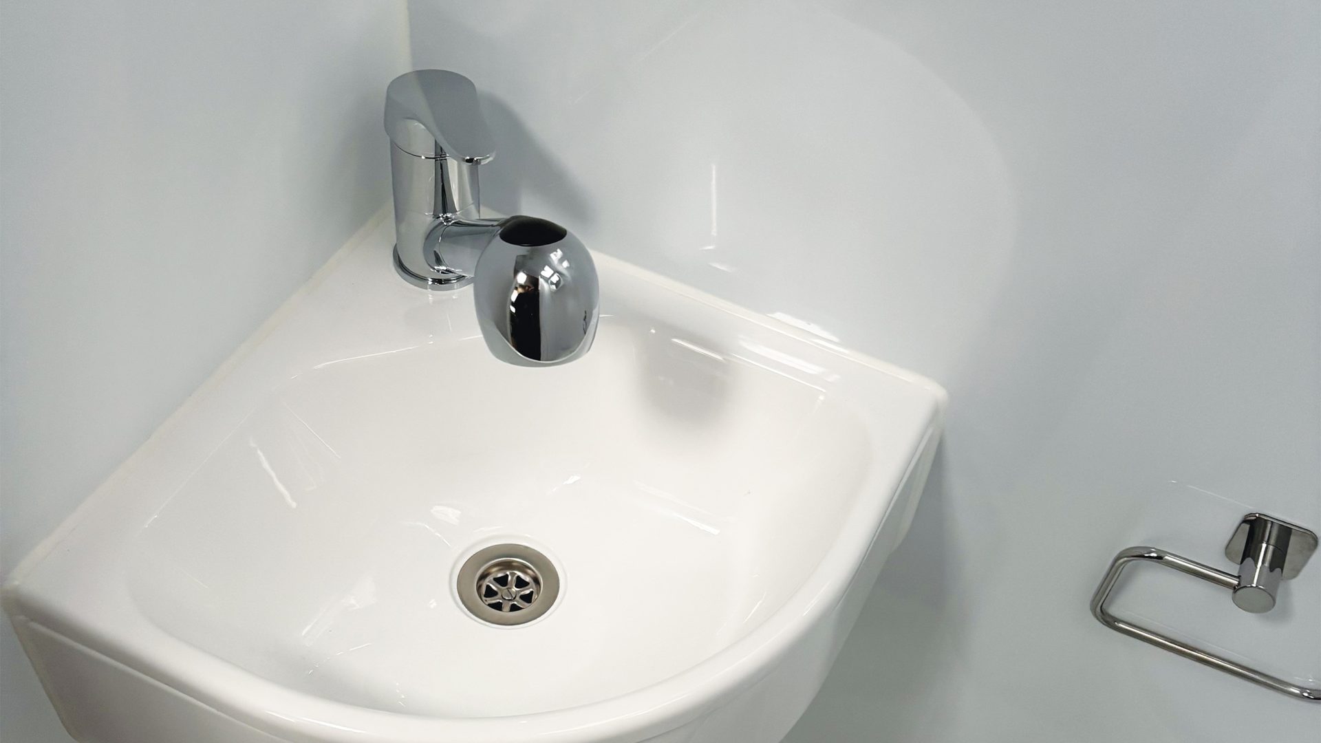 The corner basin on the DUET van conversion motorhome.