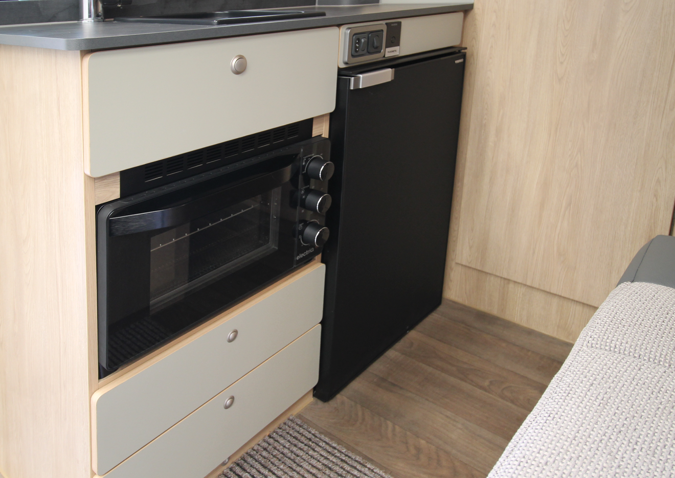 The updated kitchen on the VIBE van conversion motorhome.